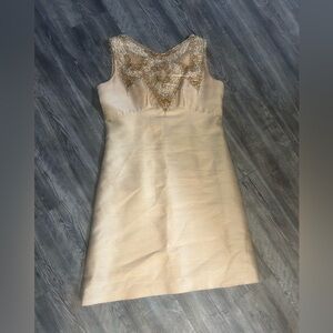 Elegant Cream Dress with Gold Embellishments